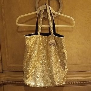 Victoria secert bag gold.